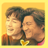 tinny: A yellow glowy closeup of Chen Minghao as Pangzi and Zhu Yilong as Wu Xie laughing together happily, with a heart (cdrama_zyl losttomb z1lcmh pangxie love)