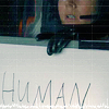 goodbyebird: Arrival: Louise Banks holding a sign that says "human". (ⓕ human)