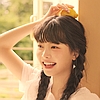 bluedreaming: Eunchae (Le Sserafin) smiling, holding a lemon (kpop - eunchae with lemon)