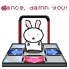 differentdances: An animated cartoon bunny dances on a Dance Dance Revolution pad and falls, gets back up, while text lights up overhead saying, "Dance, damn you!" (Default)