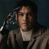 xp_forge: Forge in a contemplative mode showing his artificial hand (Cybernetics)