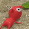 starrbar: A red pikmin lying on their back, looking surprised. (red-pikmin)
