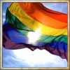 e_k_braveman: The rainbow flag flowing in the wind as the sun shines behind it. (sunshine challenge)