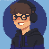 biffu: a pic of the author, smiling. is wearing glasses and headphones (Default)