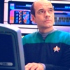 green_idylls: voyager's doctor looking up from computer quizzically (doctor)