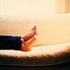 hilarytamar: the feet of a woman lounging on a couch (posts--feet on couch)