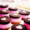 gloom_and_rainbows: Chocolate and pink coloured desserts with pink hearts on top. (pic#16691768)