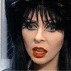 gloom_and_rainbows: A gothic famous woman, Elvira, raising her eyebrows. (elvira)