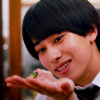 linky: Houtarou holding up some of his lunch and smiling (Gotchard: Houtarou Food)