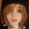 splinterwrites: Photo of a ball-jointed doll with open mouth and vampire teeth (jaydoll)