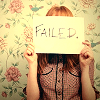 milkymoon: Woman holding a sign reading 'Failed'. (Failed.)