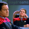 lilly_c: Kathryn smiling at Chakotay in the breifing room daydreams in a grey block and transparent text (Kathryn & Chakotay - daydreams)