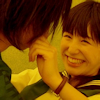 sarajayechan: Yuka smiling as she grabs Kai's cheeks like he did to her earlier ([Magiranger] Kai/Yuka)