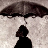 zakarisz: Tom Waits under an umbrella which is leaking snakes (alice)