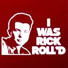 juniperberry: a picture of rick astley's face with the phrase "I was RickRoll'd" next to it (rick roll'd!)
