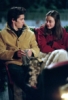 noxelementalist: Jess and Rory go on a sledride, Jess wearing a tan coat with fur lining and Rory in a red coat (Jess, Rory)