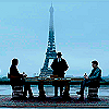 passingbuzzards: Men at a table in front of Eiffel Tower (john wick: under the high table)