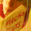 goodbyebird: Love Lies Bleeding, Lou is reading a short story collection titled "Macho Sluts". (ⓕ macho sluts)