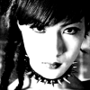 danshi: black and white photo of a very feminine toshiya from dir en grey's early days (rbf)