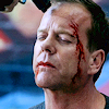 out_of_time: Jack with blood on his face and a gun to his head (Bad day)