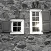 snickfic: Two white-framed windows set in gray stone wall (windows)
