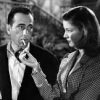 sporky_rat: Lauren Bacall lighting a cigarette for Humphrey Bogart (bacall and bogart)