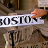 sholio: hand holding boston sign (MASH-boston 1)