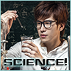 amedia: Young Chinese man wearing horn-rim glasses and a lab coat focusing intently on a dropper over a beaker; caption reads SCIENCE! (Guardian: Lin Jing Science)