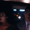 mattressstoreddx: a woman and a man sitting together in the back of a car. (in the mood for love)