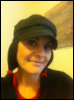 blogofmanythings: me, a white woman with long black braids and a black cabbie hat. (Default)