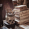 yarnofariadne: a human skull wearing a crown next to a pile of books (misc: 100 years from the empire now)