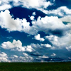 watersword: A blue sky full of puffy white clouds (Stock: sky)