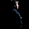 watersword: John Sheppard facing away from the viewer and partially lit. (Stock: illuminated)