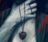 purplethebunny: A digital painting of a person with a hand around their own neck holding a dark heart shaped necklace (heart)
