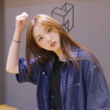 kestrelofink: Lee Jiwoo of tripleS looks at the camera, head tilted to the right, long hair falling over her shoulder. She is reaching up to brush her hair back. (Default)