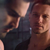 whimsicalmeerkat: A side view of Derek Hale's face with Peter Hale looking at him from the background. (deter)