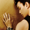 tinny: Sad Wu Lei in a sleeveless shirt, his hand and forehead against the wall, in warm brown and black tones (wulei_shoulder)