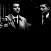 emeraldarrows: Supernatural - Dean turning Castiel's badge the right way up (15)