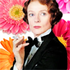 sweettartheart: Maggie Smith from Death on the Nile, on a flowered background (RP Maggie Flowers)