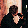 trillingstar: rozanov's confession | centred, rozanov looks away from camera, holding his phone to his face (hr confession)