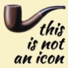 jesse_the_k: Pipe from Magritte's Treachery of Images captioned "this is not an icon" (lost youth)