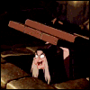 zarla: evil queen in her old hag disguise from snow white going down a trapdoor (cackling down)
