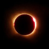mdlbear: The sun, almost completely eclipsed, with diamon-ring effect. (solar-eclipse)
