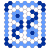 soc_puppet: Two flowers made of blue hexagons facing opposite directions in a frame of blue hexagons (Hex Quilts)