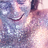 outlineofash: A person covered in silver glitter smiles. (Smile - Big Smile)