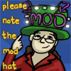 sqbr: me pointing to a hat with neon sign saying Mod on it. (mod hat)