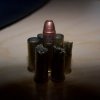 jecook: 1 single round of .22 long rifle surrounded by empty cases. (Guns!)