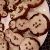 gingicat: (snowman cookies)