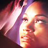 niciasus: (Startrek 2009 Uhura glazing at Spock)