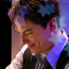 cptjackharkness: (Smiling down sitting)